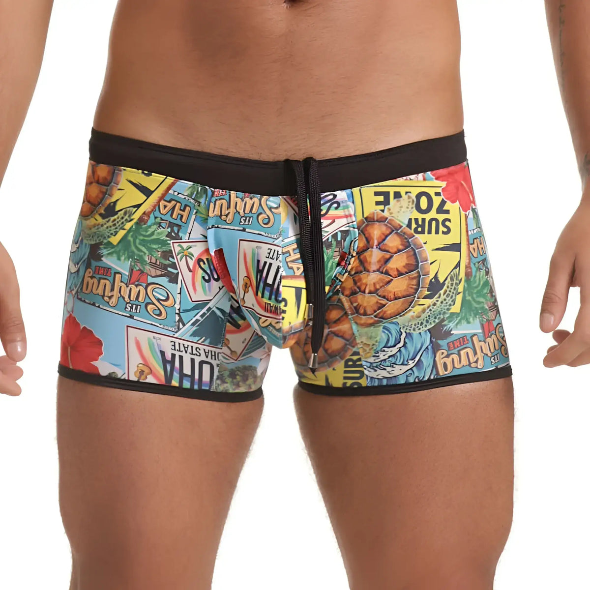 Gigo Seventies swim trunk with vibrant tropical surf collage and black elastic waistband with drawstring