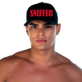 Black baseball cap with bold red embroidered sniffer lettering front in gigo sniffer caps collection