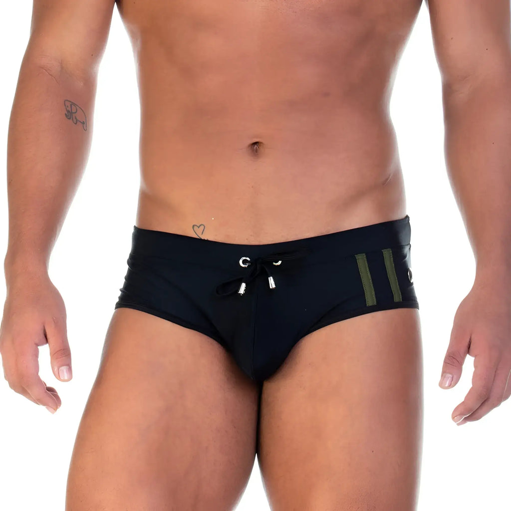 Gigo Soccer black swim brief with olive green vertical stripes and silver-toned drawstring hardware for swimming