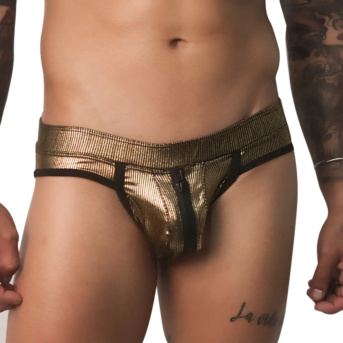 Metallic gold jockstrap with a textured finish, black trim, and a functional front zipper closure.
