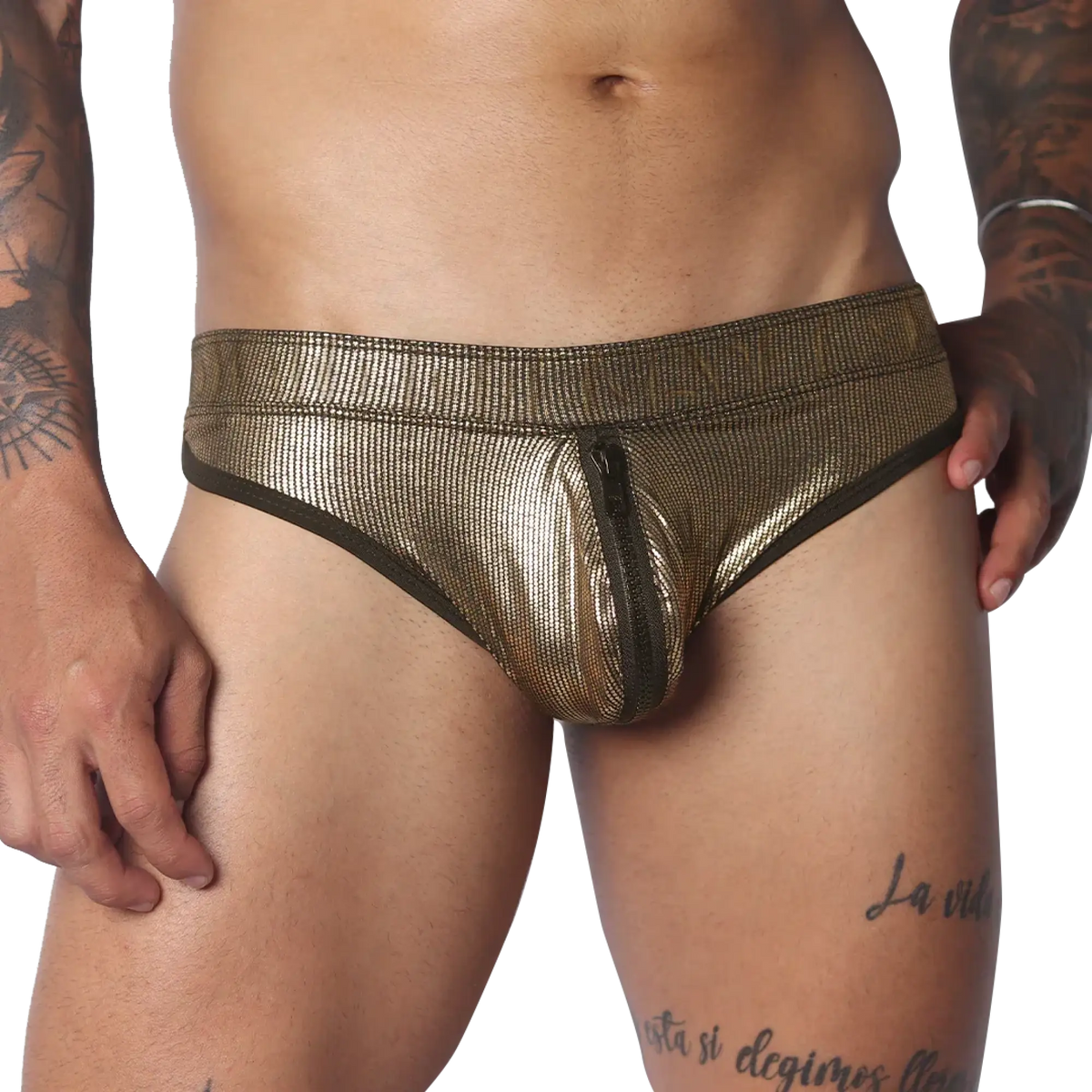 Metallic gold ribbed brief with a center front zipper and dark trim on a muscular torso.
