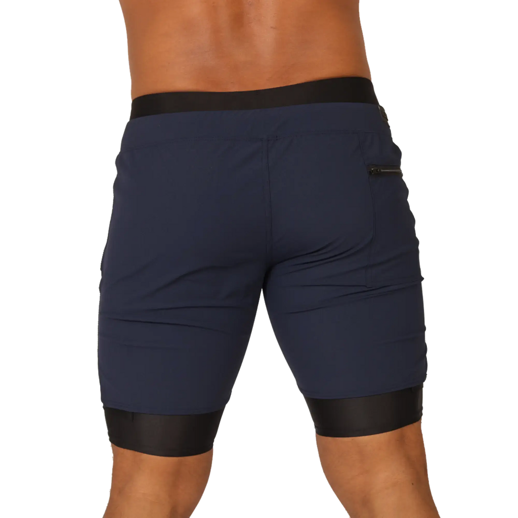 Navy blue gigo sporty short with black elastic waistband and leg cuffs featuring a zippered side pocket
