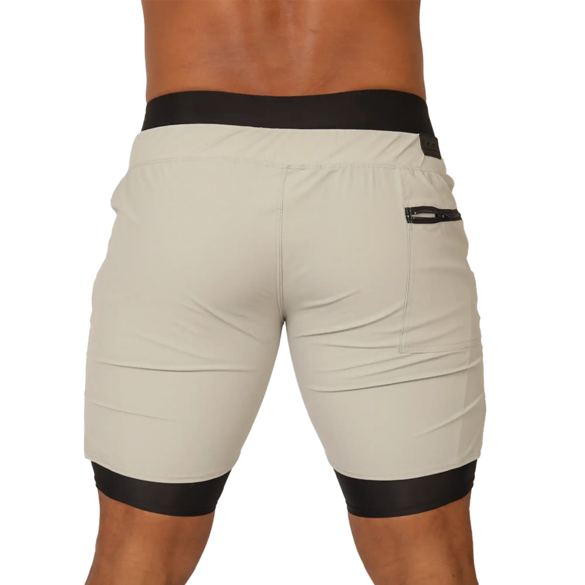 Beige gigo sporty gray short with black elastic waistband and leg cuffs featuring a side zip pocket for activewear