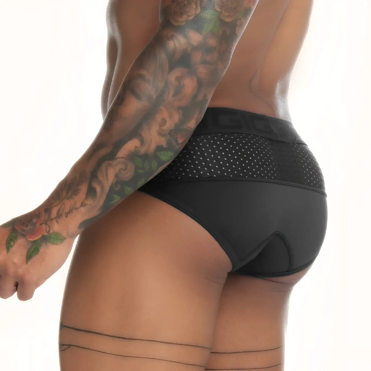 Black gigo strech athletic briefs with a perforated mesh waistband and subtle branding for comfortable wear
