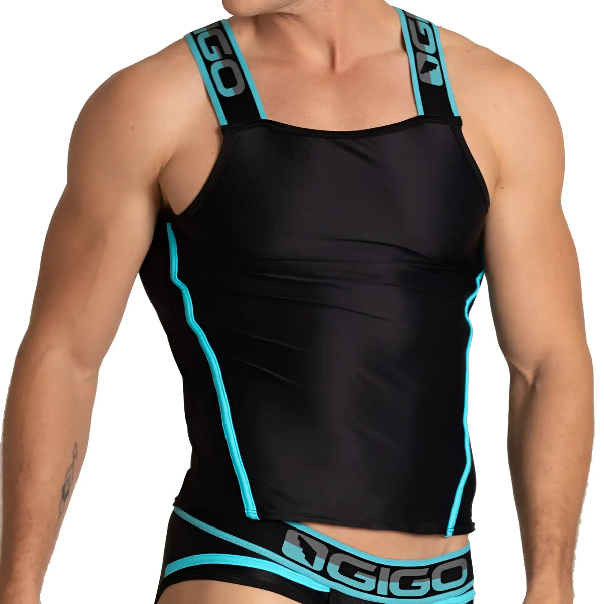 Black gigo style tank top with teal trim and logo detailing visible on the front side