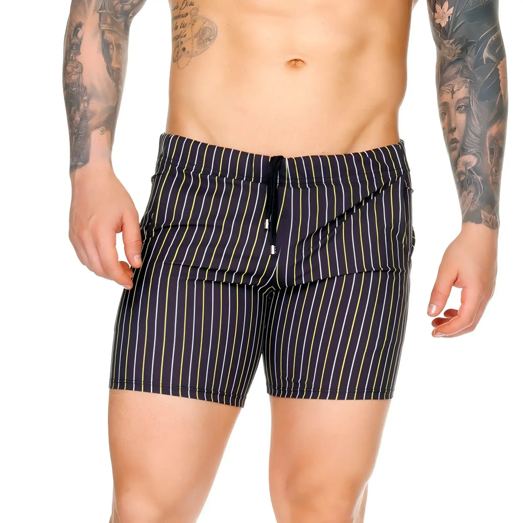 Navy blue Gigo Sultan black beachwear swim trunks with yellow and white vertical stripes and a drawstring waistband