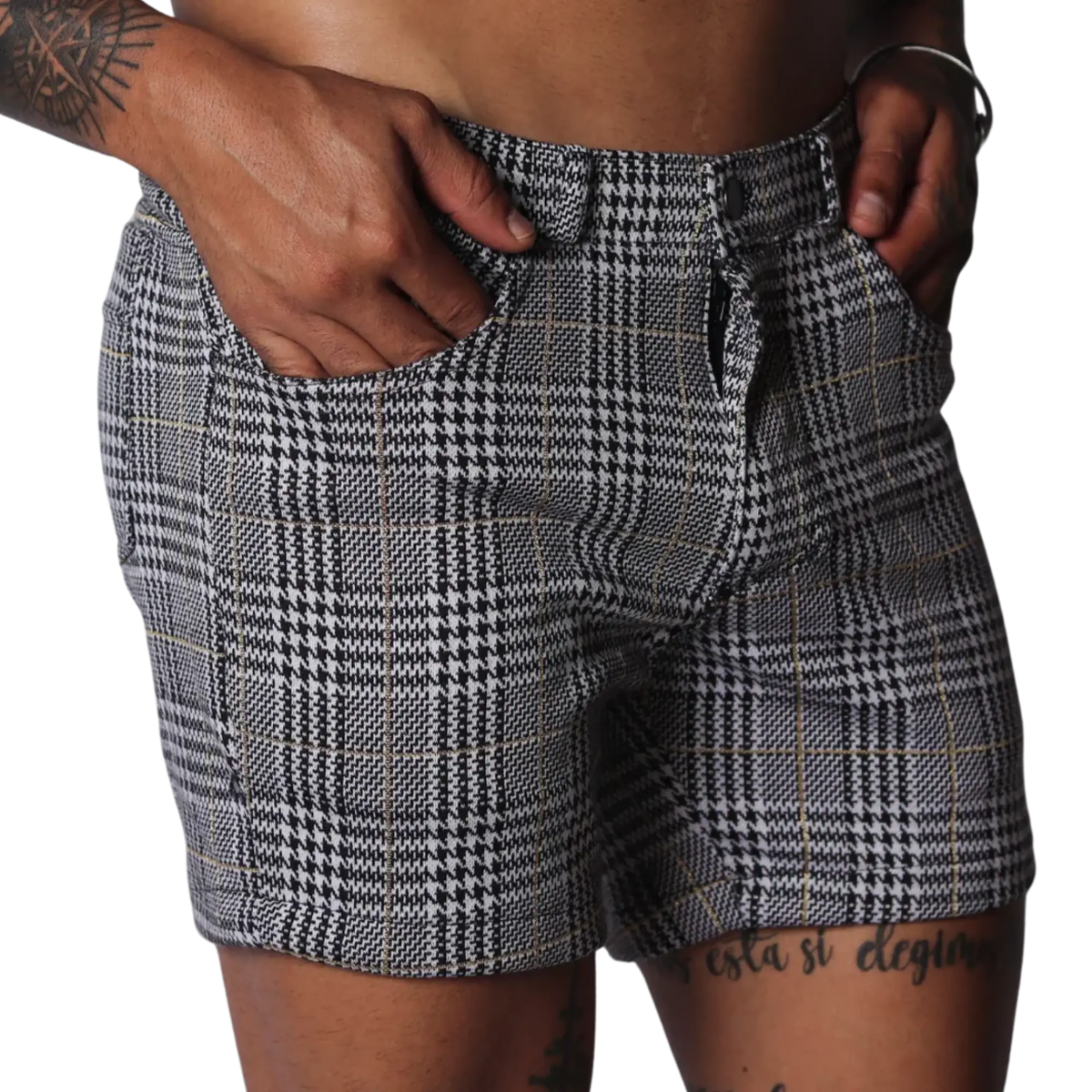Men's slim-fit shorts in a black and white houndstooth glen plaid pattern with subtle gold thread accents.