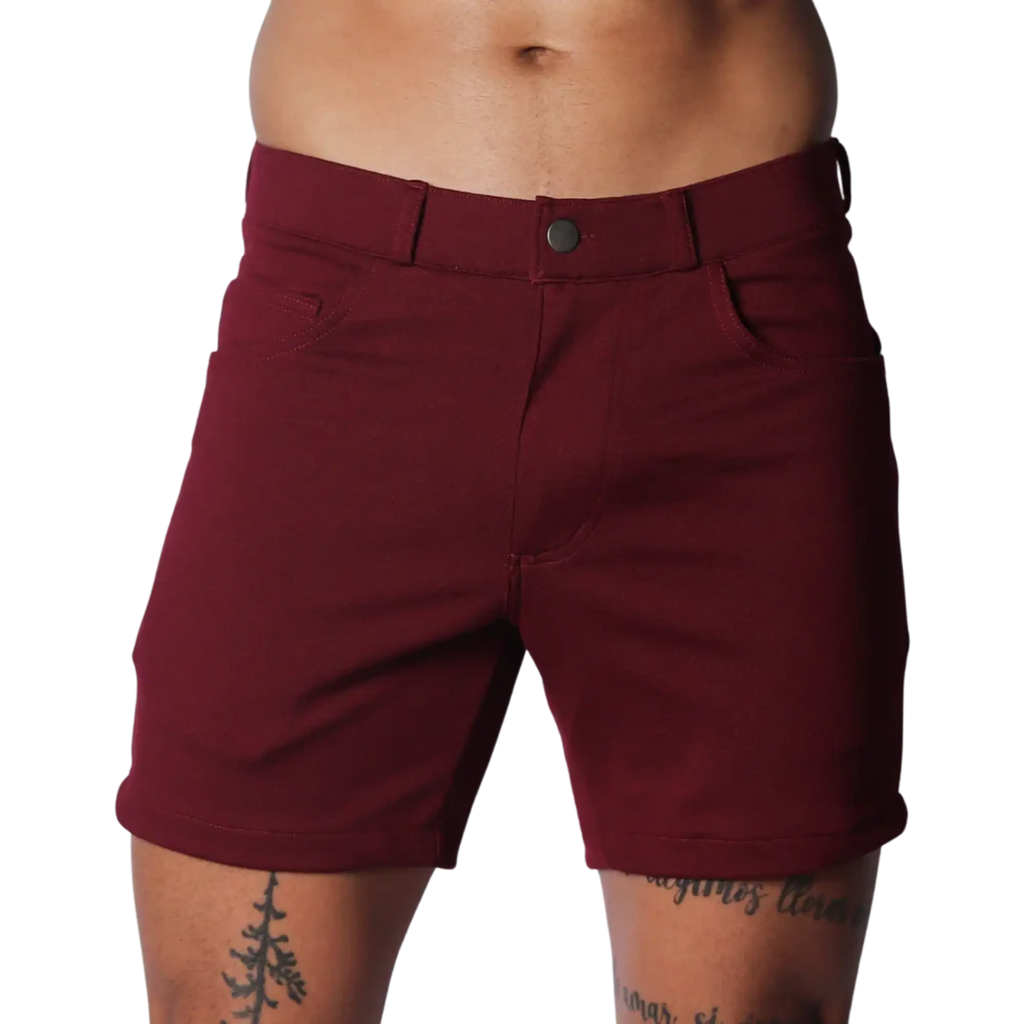 Wine-coloured tailored shorts with a structured waistband, button closure, and classic five-pocket design.