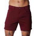 Wine-coloured tailored shorts with a structured waistband, button closure, and classic five-pocket design.