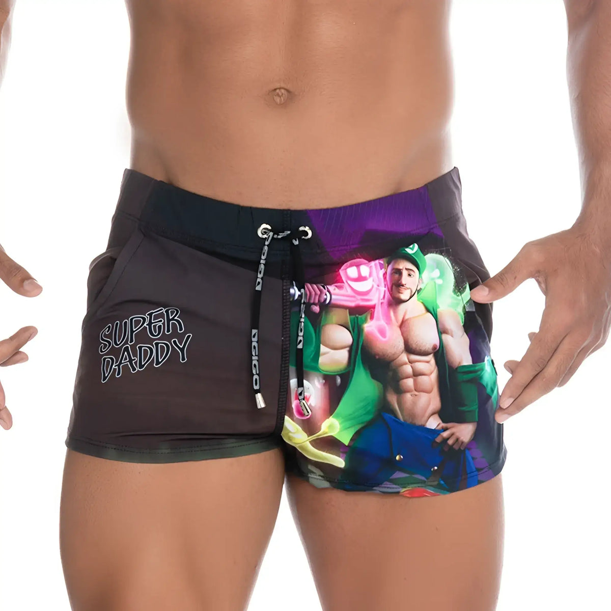 Black Gigo Super Daddy purple beachwear swim trunks with vibrant graphic of muscular man in green holding neon accessories