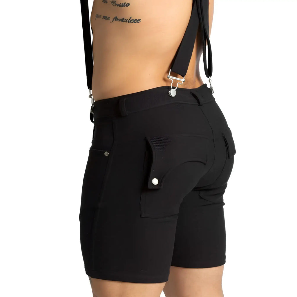 Black gigo suspenders with silver metal clasps and adjustable straps worn over black shorts front view