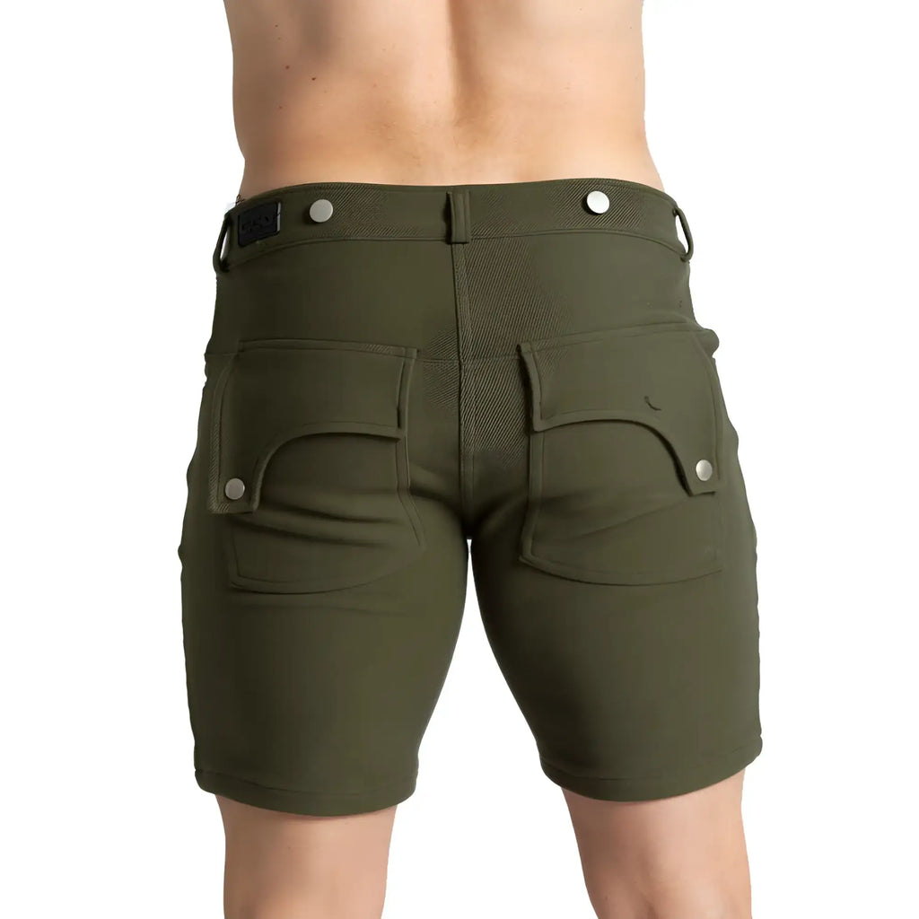 Olive green textured fabric gigo suspenders shorts with silver button closures and rear pockets shown from the back