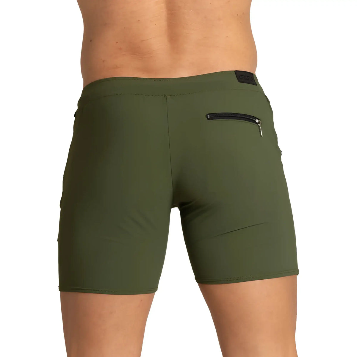 Olive green gigo tennis shorts with black zipper pocket and small brand patch on waistband for athletic use