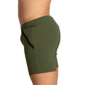 Olive green gigo tennis shorts with black zipper side pocket detail designed for athletic use