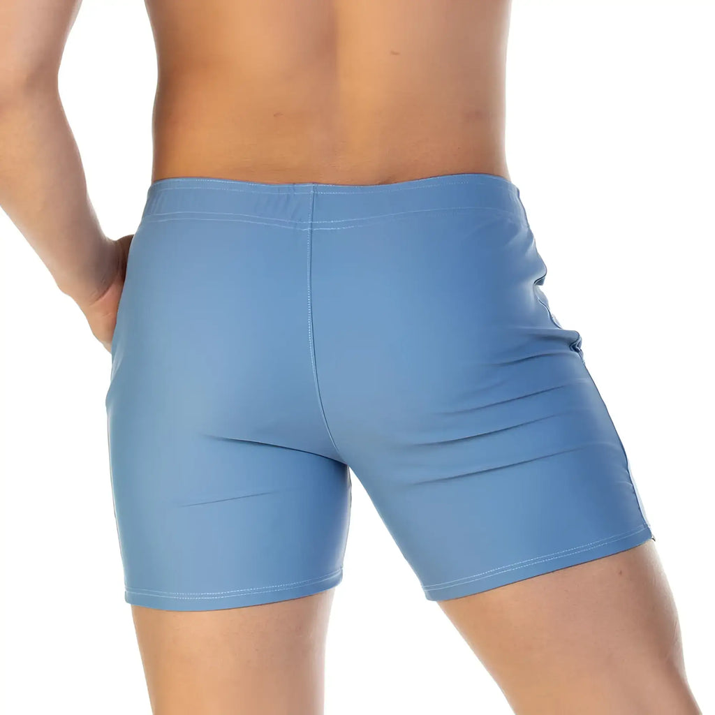 Gigo traditional blue beachwear light blue form-fitting swim trunks with smooth stretchy fabric and subtle seam detailing