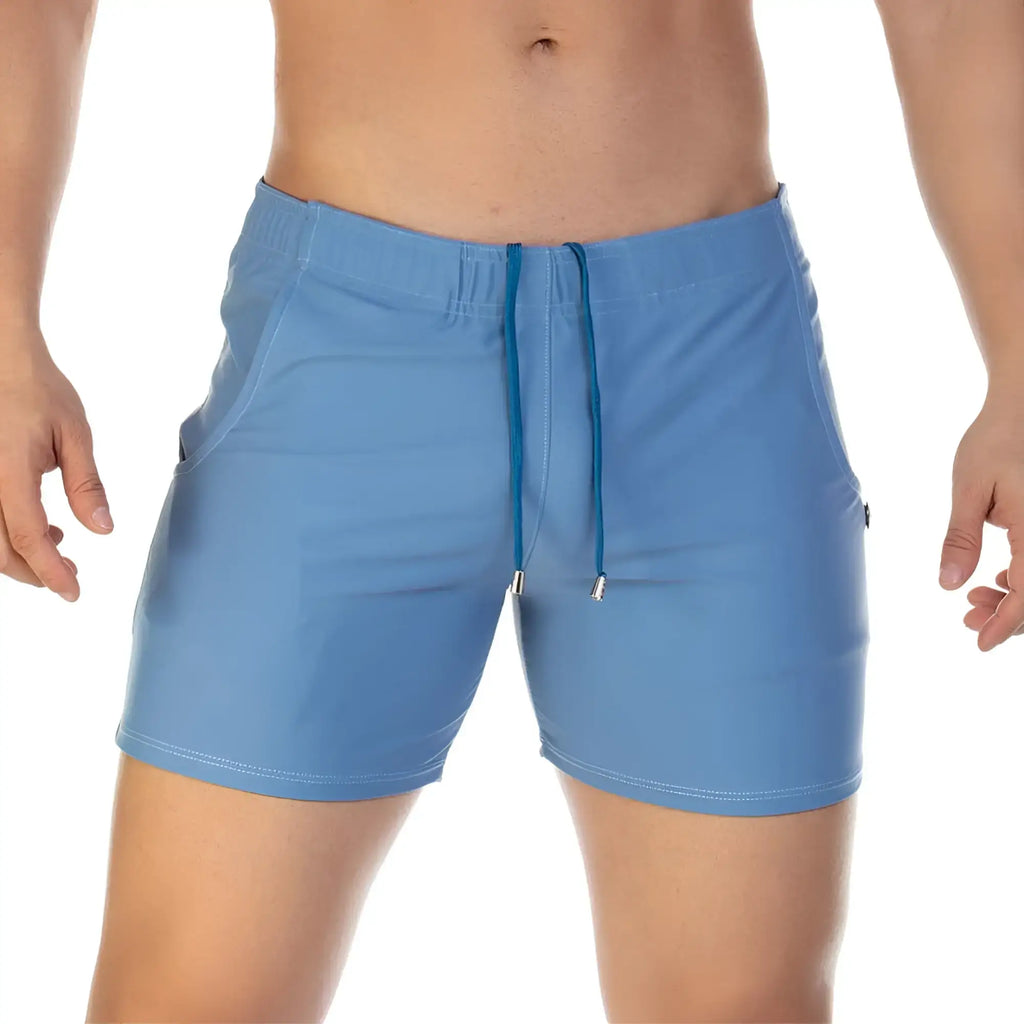 Light blue Gigo traditional beachwear athletic shorts with drawstring waistband and side pockets for casual wear