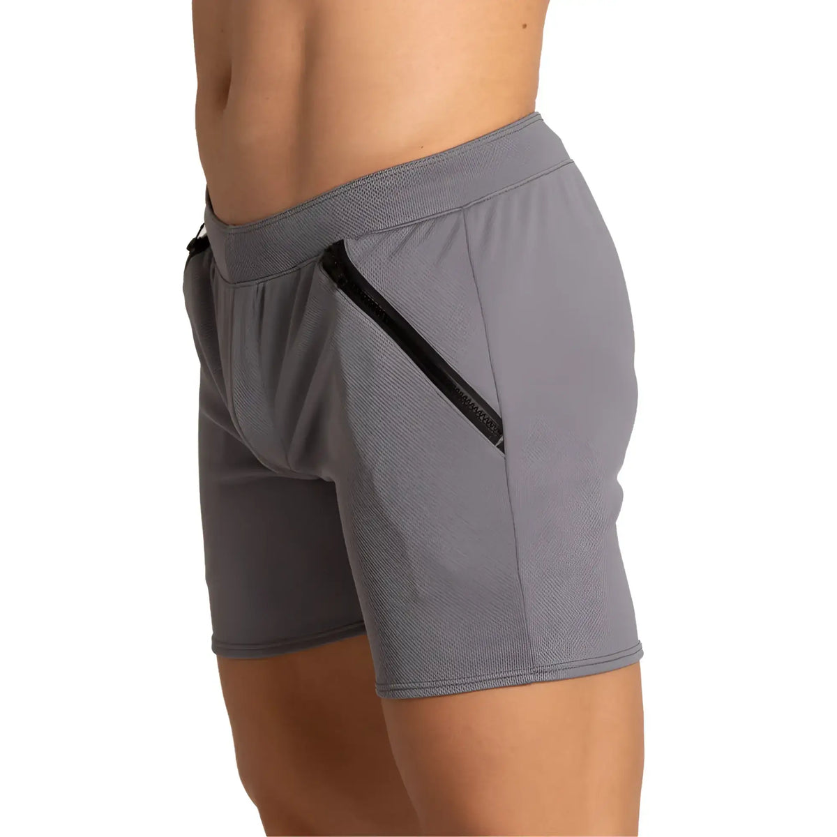 Gigo training gray short made of textured fabric with black zipper pocket on the side for athletic use