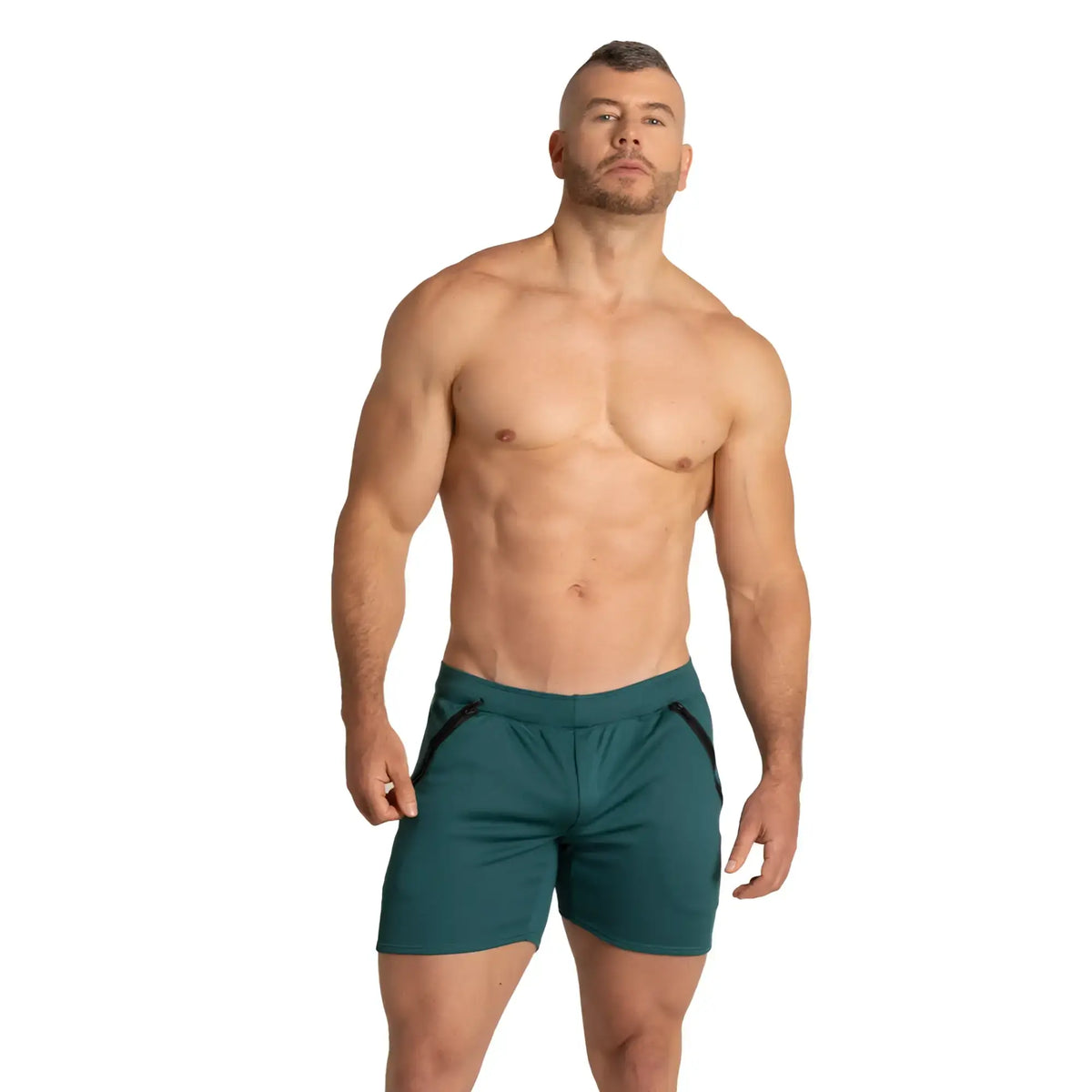Teal gigo training green athletic shorts with black zipper accents on side pockets for workout use