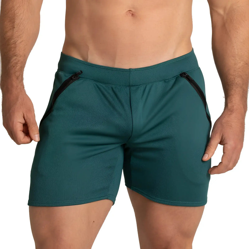 Teal gigo training green athletic shorts with black side zipper accents designed for workout and training use