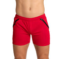 Gigo training red athletic shorts with black side zipper accents designed for active wear and training sessions