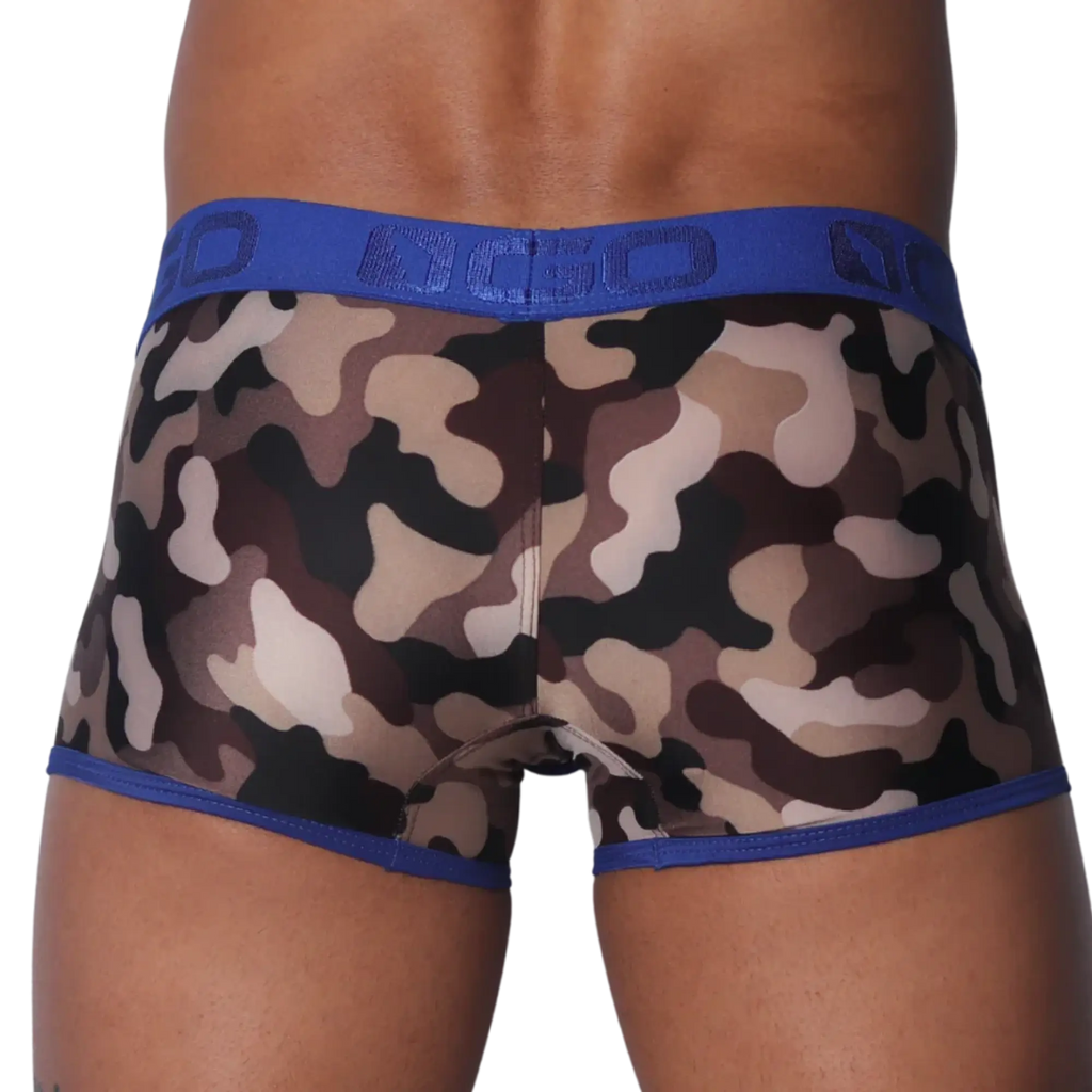 Camouflage-print trunks with a blue branded elastic waistband and blue trim along the leg openings.