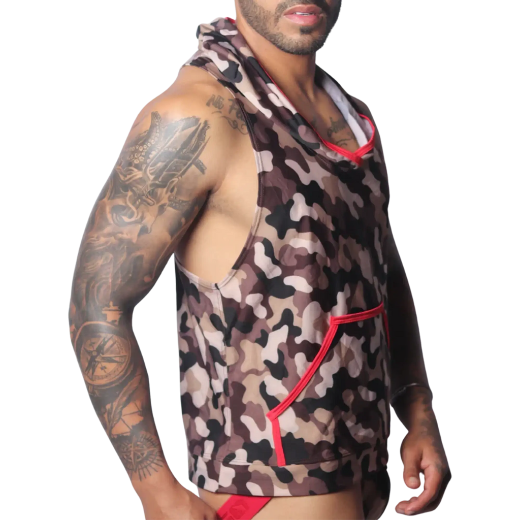 Sleeveless camo print hoodie with red trim and a front pocket, worn by a man with arm tattoos.