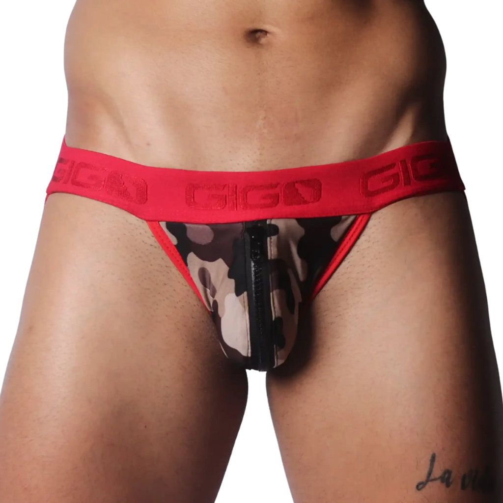 Camouflage jockstrap with a front zipper, featuring a red elastic waistband with embossed GIGO logo branding.