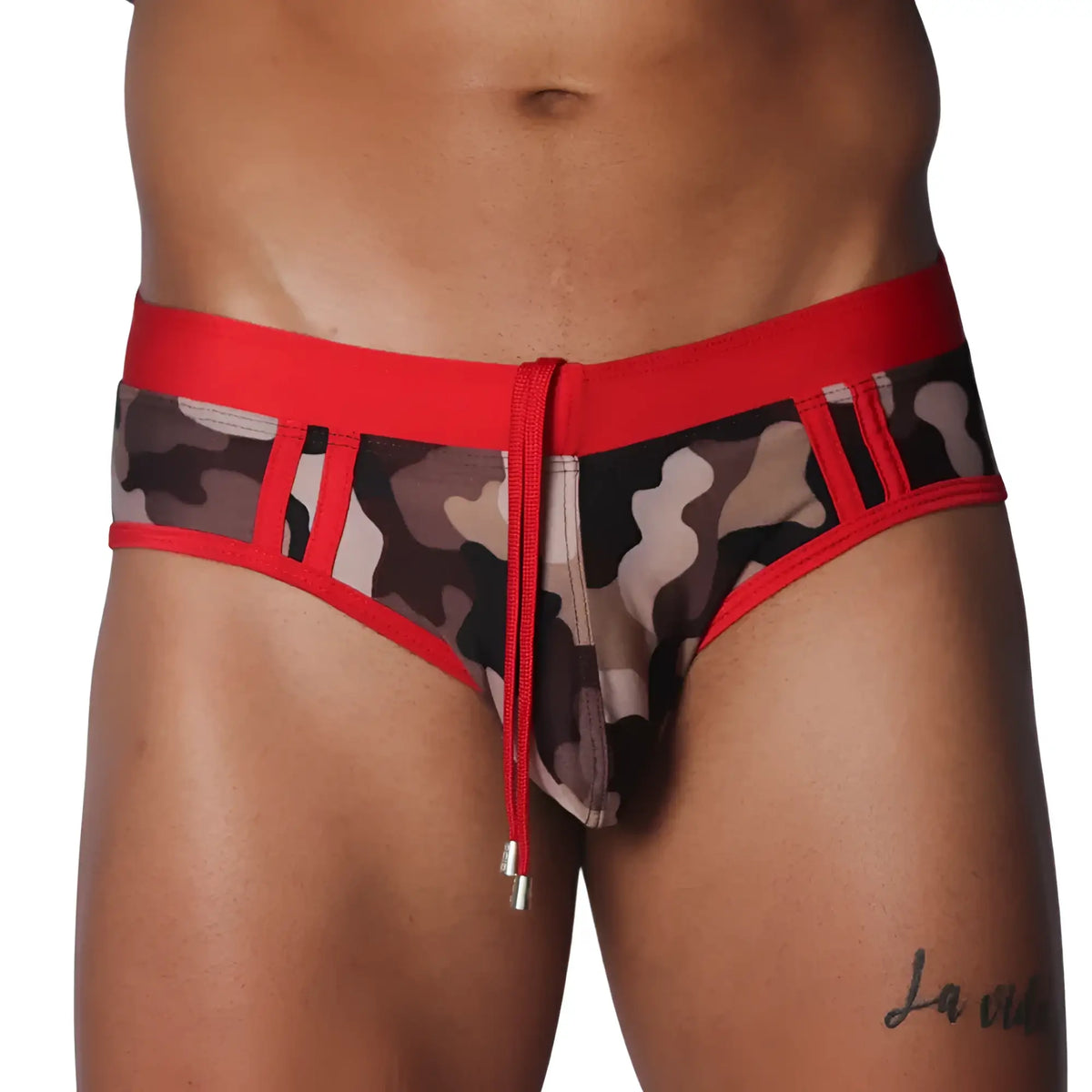 Camo print swim brief with red waistband, trim, and central drawstring featuring metallic aglets.