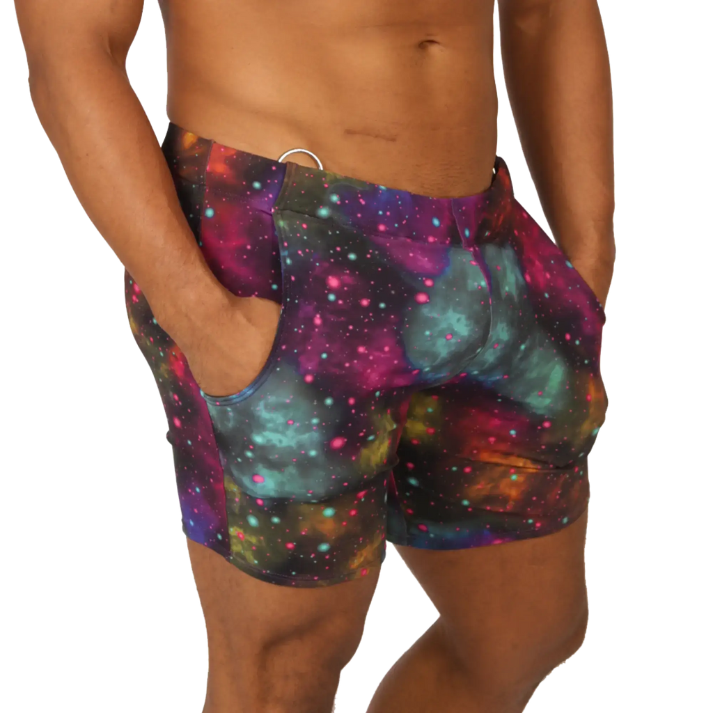 Gigo universe beachwear vibrant galaxy-print swim trunks with magenta teal and purple nebulae and star-like dots