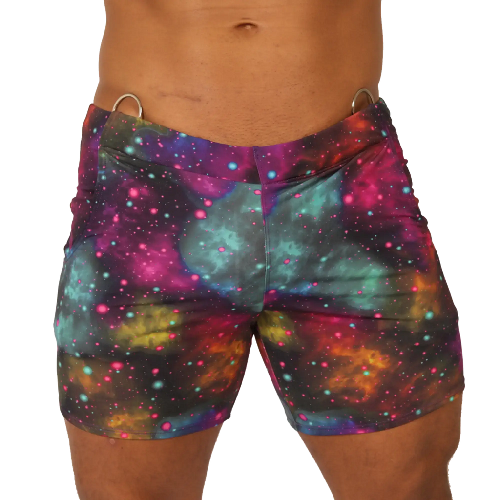 Vibrant Gigo Universe beachwear galaxy-print swim trunks with swirling nebulae in purple teal pink and orange