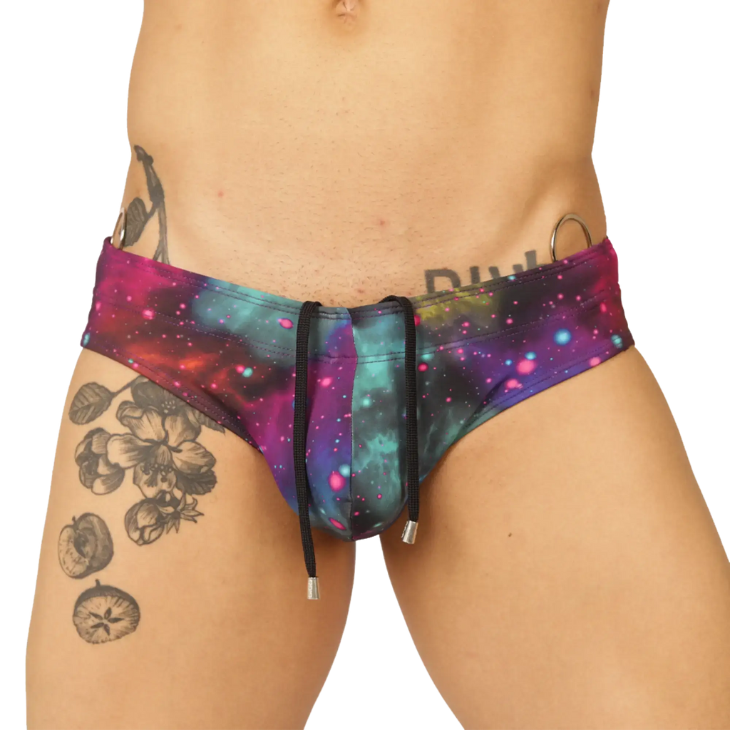 Gigo universe swimbrief vibrant galaxy-print swim trunks with magenta teal and cosmic sparkles design