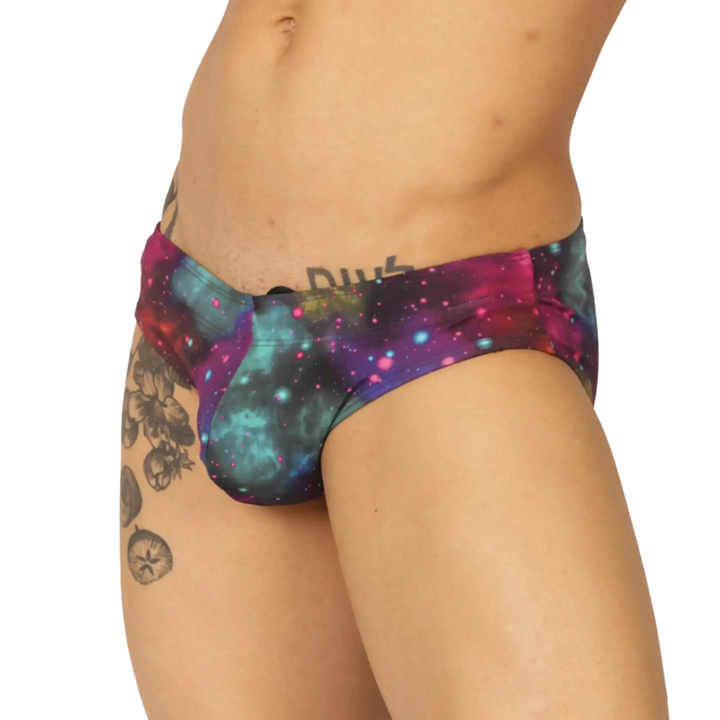Gigo Universe swimbrief with vibrant galaxy pattern in purple teal and pink glossy fabric finish for swimming