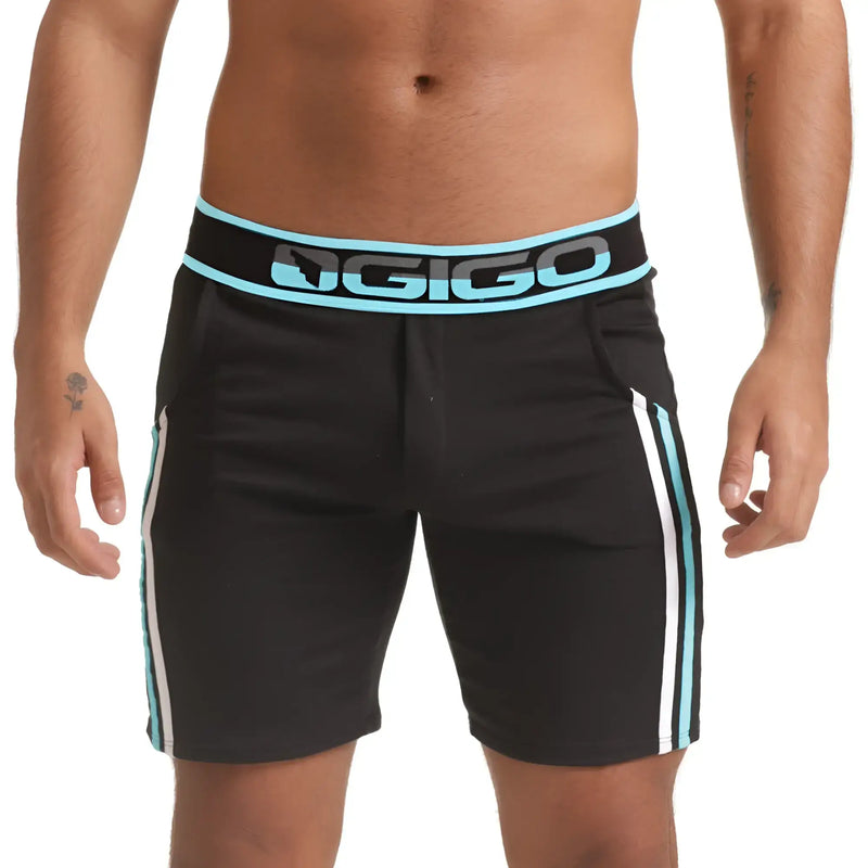 Black gigo versatil blue athletic shorts with light blue and white side stripes and branded waistband