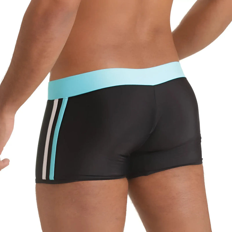 Gigo Versatil Blue swim trunk featuring black fabric with light blue waistband and two vertical stripes on the side