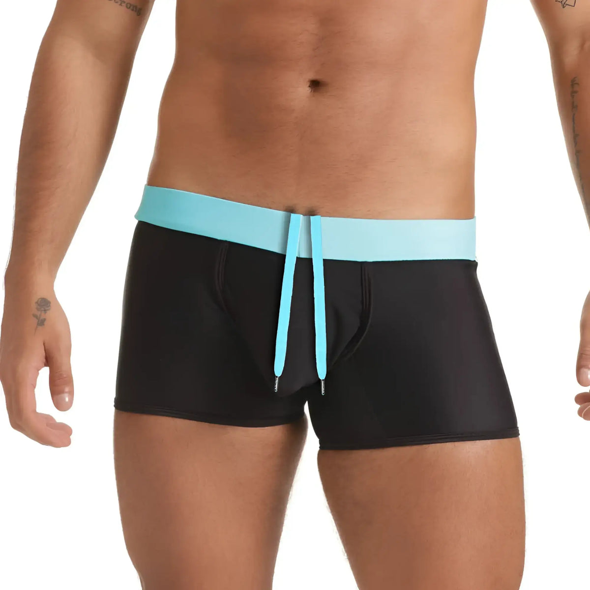 Black gigo versatil swim trunks with a light blue elastic waistband and matching drawstring for versatile use