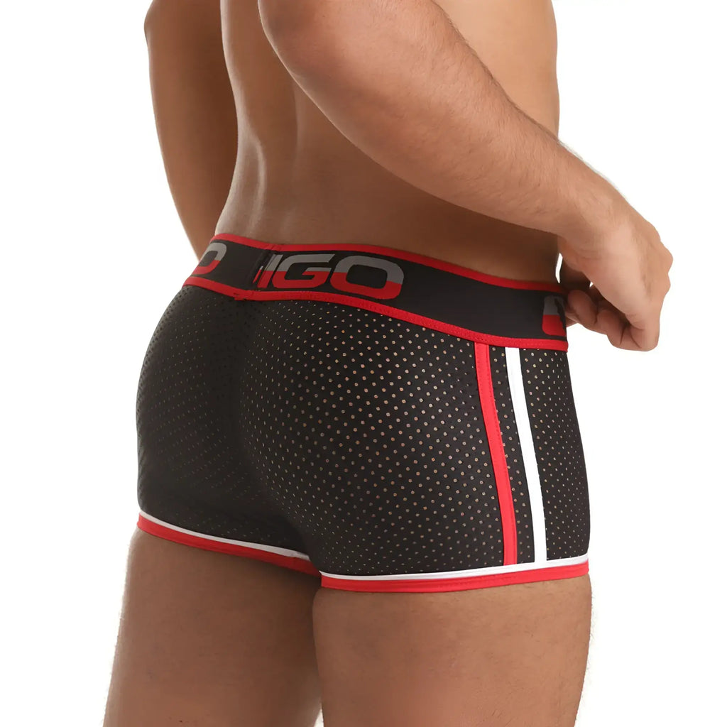 Black mesh briefs with red and white trim and bold igo logo on waistband from gigo versatil red trunk collection