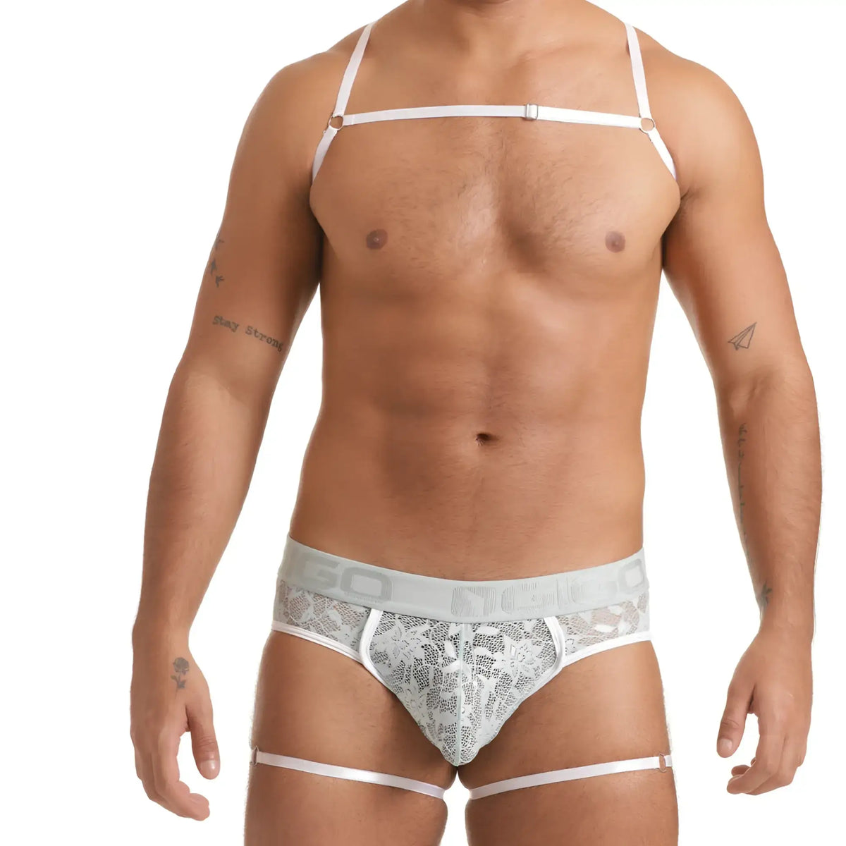 White lace-trimmed briefs with matching white harness strap and light gray elastic waistband with nico branding