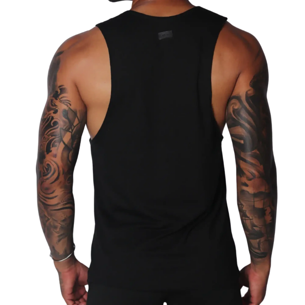 Black sleeveless cotton tank top with dropped armholes, a raw edge finish, and a small logo patch at the nape.