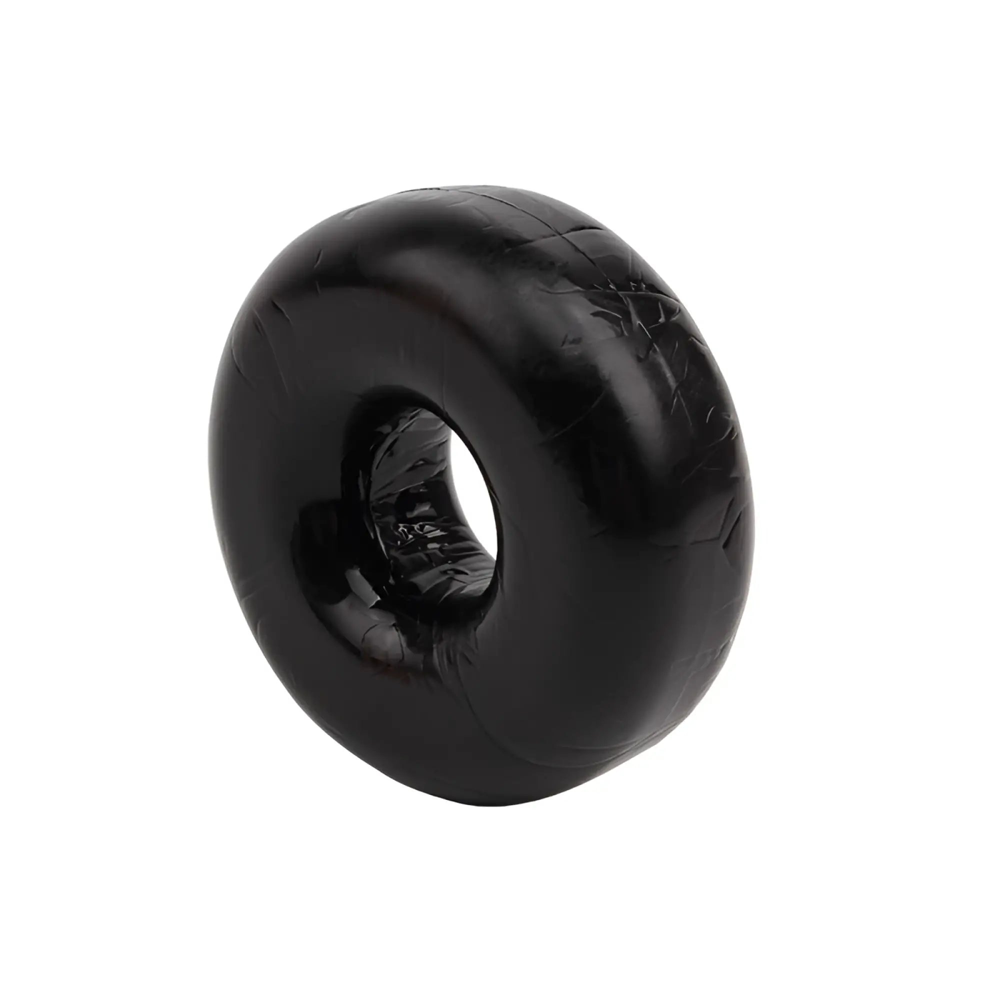 Black rubber donut-shaped gk power fat o cock ring with glossy finish and visible texture one size fits all
