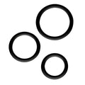 Three black rubber o-rings of varying sizes in the gk power magnum force cock ring set one size