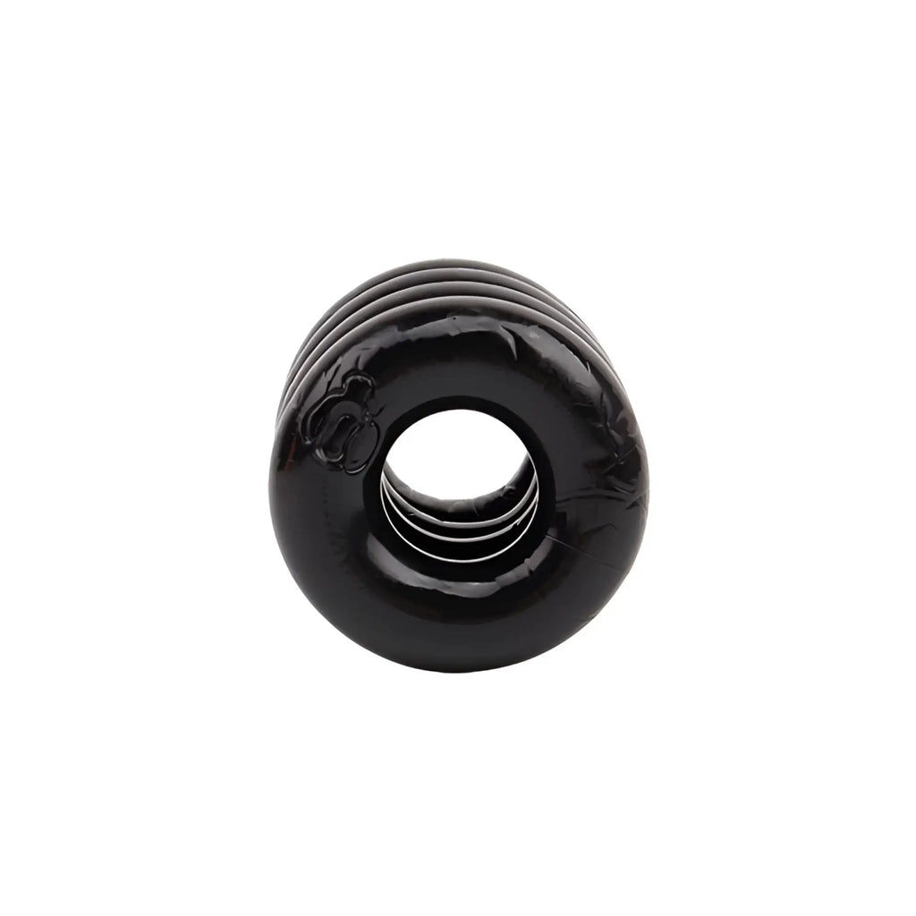 Black glossy silicone cock ring with concentric ridges and central hole for enhanced power and comfort by GK Power Quadplay