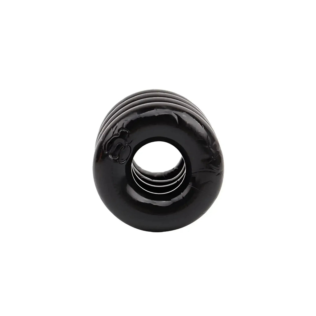Black glossy silicone cock ring with concentric ridges and central hole for enhanced power and comfort by GK Power Quadplay