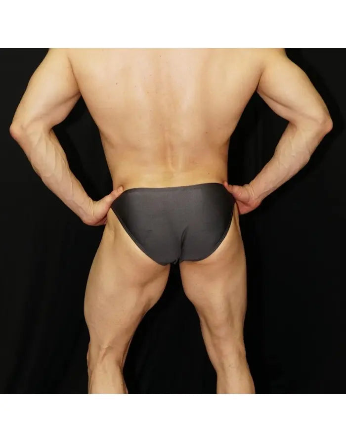 Men's grey bikini underwear by Arroyman featuring a sleek fit and smooth fabric shown from the back on a model.