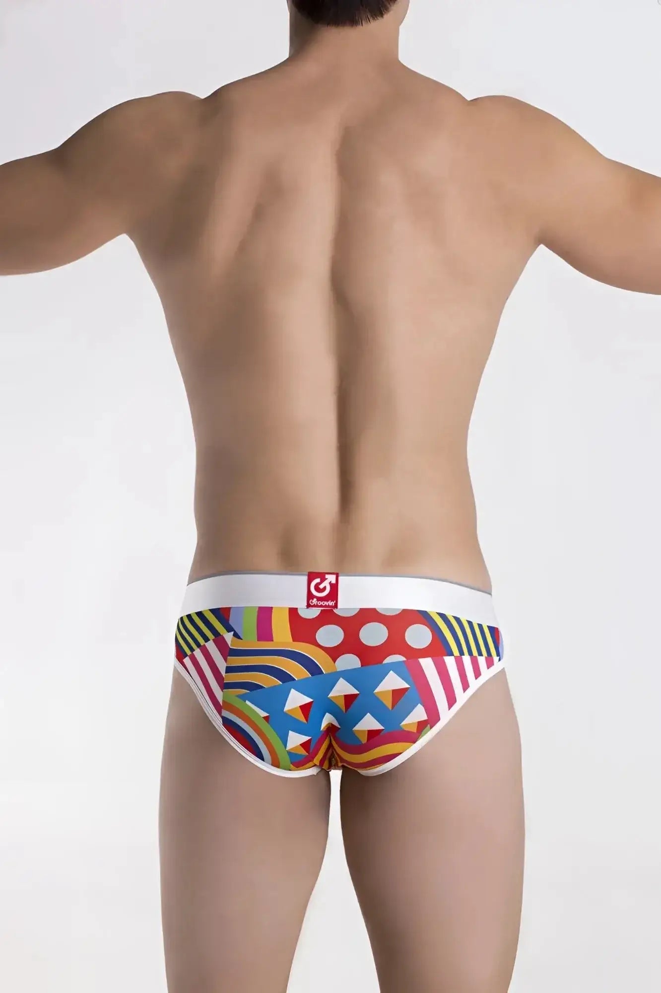 Vibrant geometric patterned men’s briefs in red blue yellow and green with white honey waistband groovin underwear hip brief