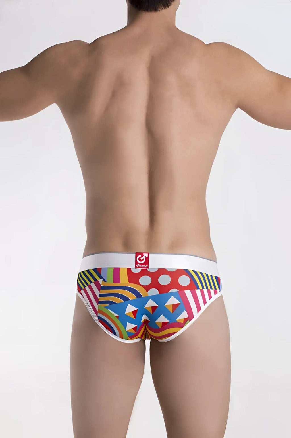 Vibrant geometric patterned men’s briefs in red blue yellow and green with white honey waistband groovin underwear hip brief