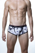 Black and white splatter-patterned men’s briefs with red-trimmed sroovin waistband groovin underwear splatter art cup boxer