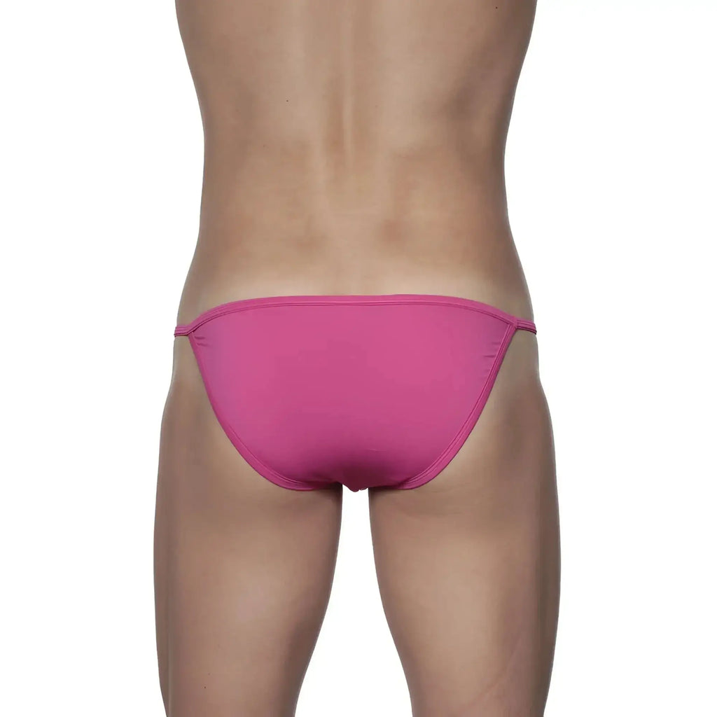Bright pink form-fitting groovin string bikini with thin elastic waistband ideal for swimwear use