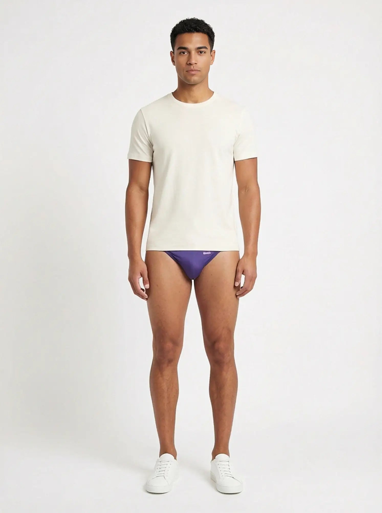 Purple groovin string bikini briefs with subtle logo on waistband indigo purple st0103 front view