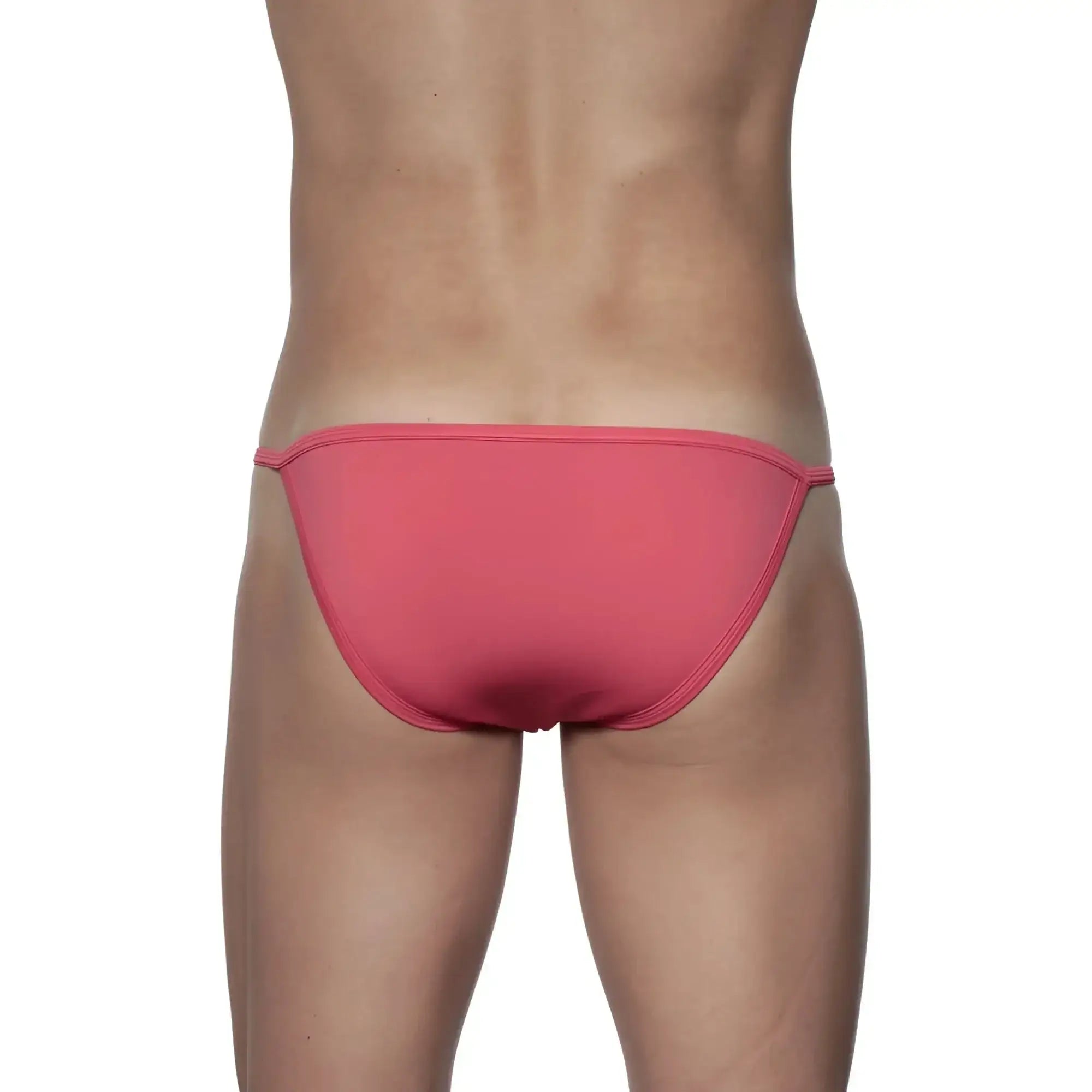 A sleek coral-pink groovin string bikini rouge red swim trunk with smooth fabric and thin side ties