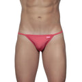 A vibrant pink groovin string bikini rouge red thong made of smooth stretch fabric with a brand tag on the waistband